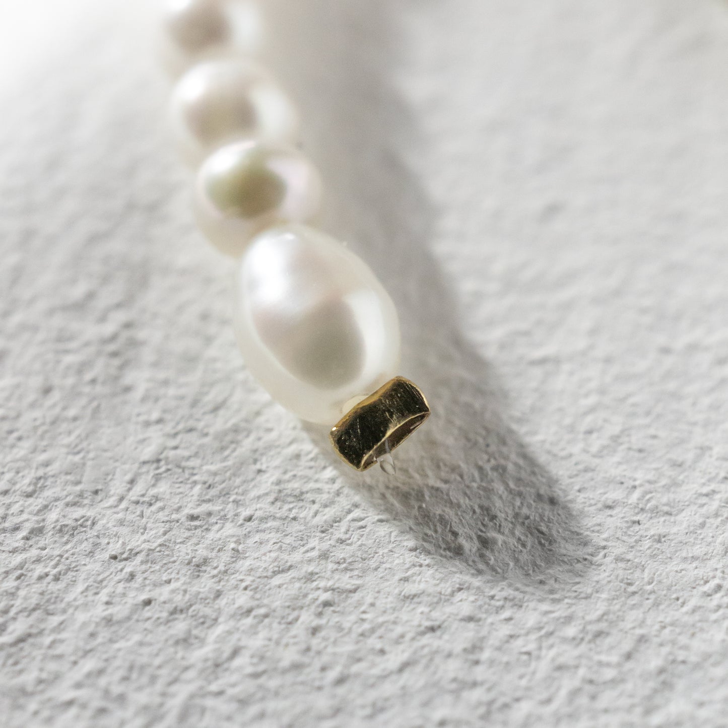 【受注生産】25AW TRIFLES ミニパールリボンピアス P0154