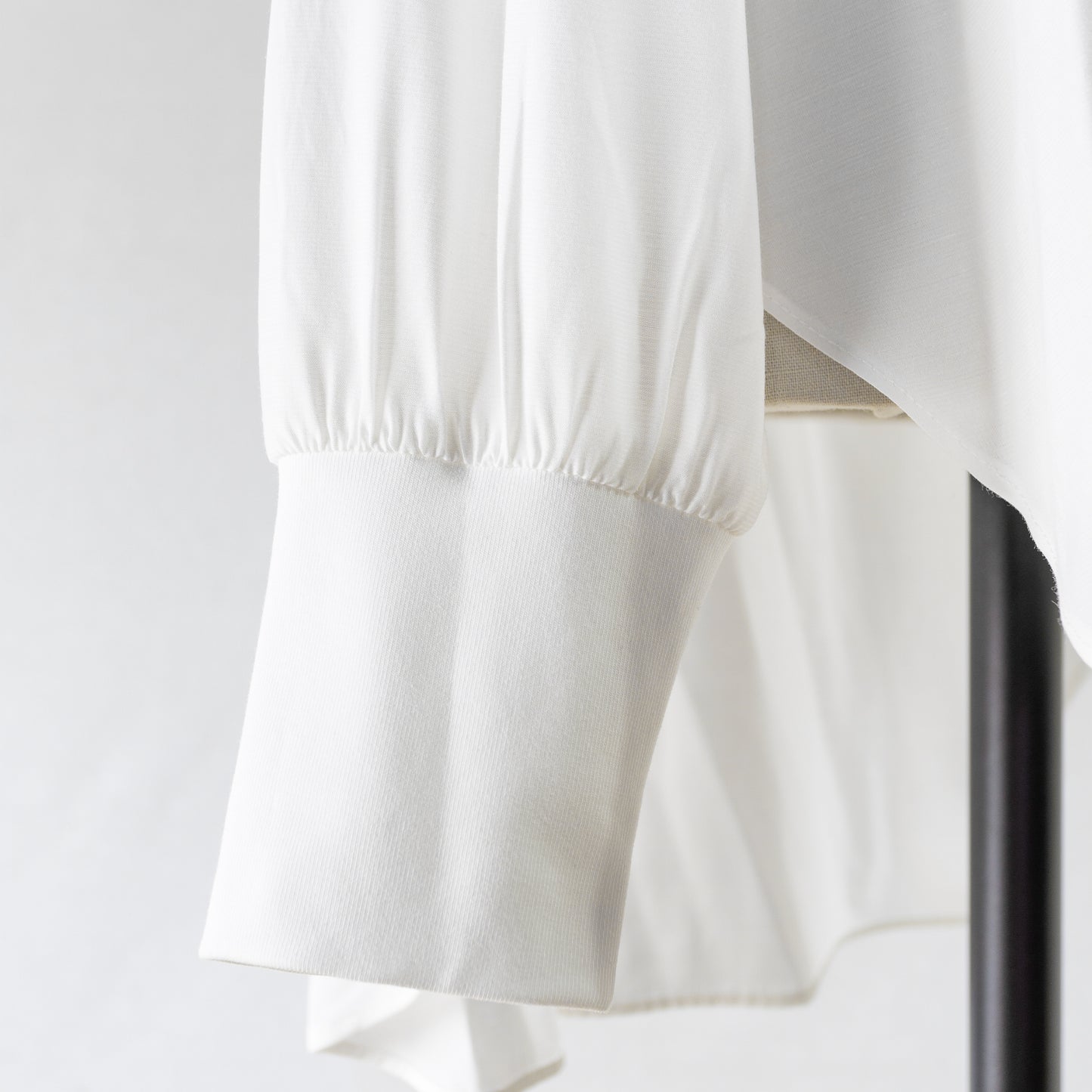 PASSIONE BACK BUTTON BLOUSE